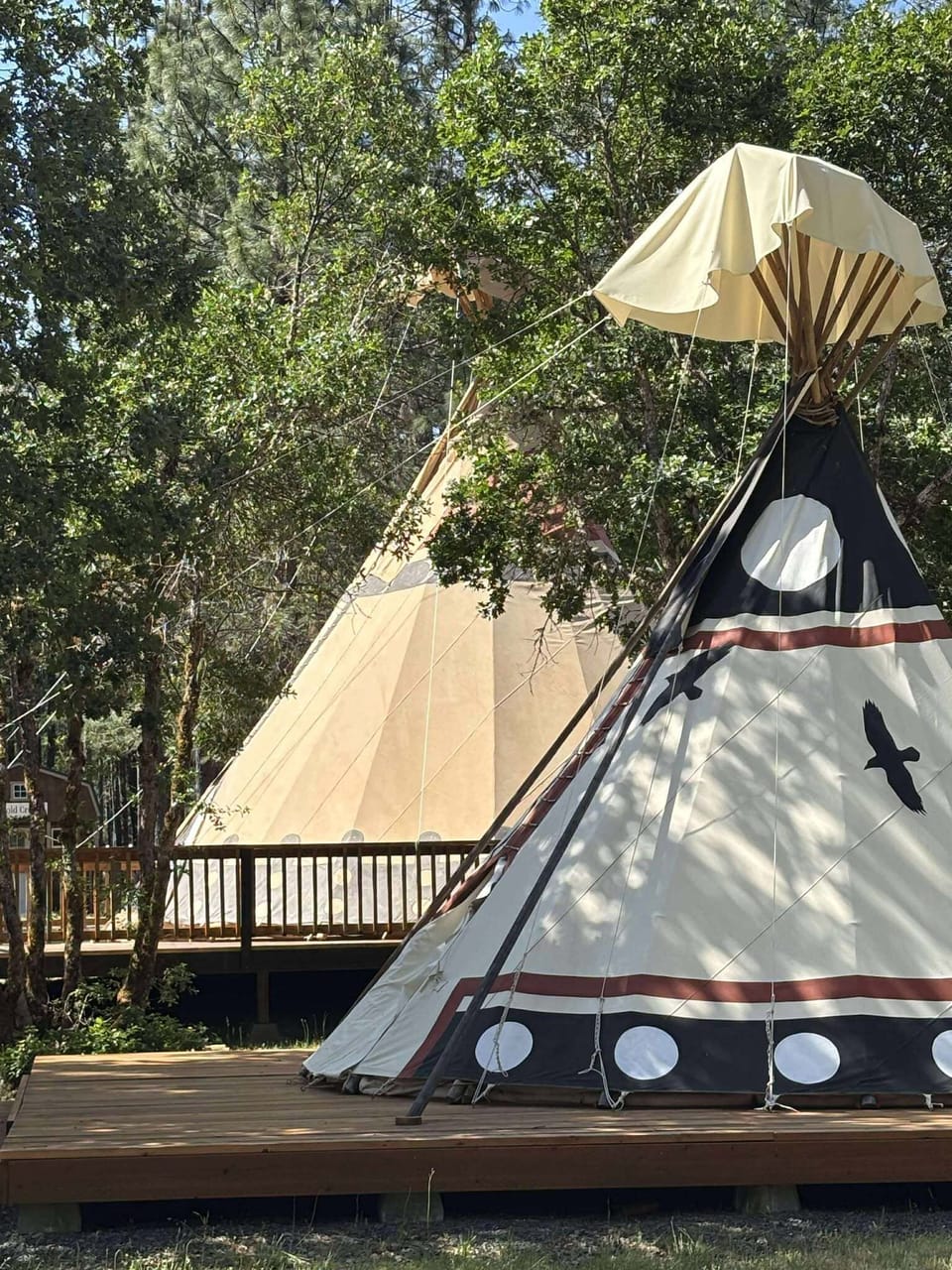 Located in our tipi village, an oversized private deck is furnished with Adirondack chairs—perfect for sunset charcuterie boards or your morning coffee among the pines.  
• Fire up the propane BBQ to sear steaks or freshly caught river trout.  
• Gather after dark around your smoke-free propane fire pit, sip Oregon Pinot, and watch constellations shimmer beyond the tipi’s crown opening.