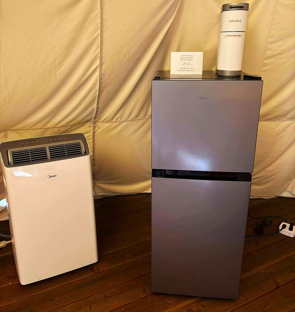 Mini-Fridge, Keurig Coffee Maker, and even two powerful Air conditioners!