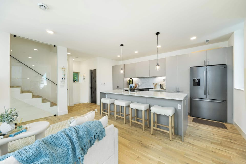 A clean style in this bright, open-concept space with premium finishes.