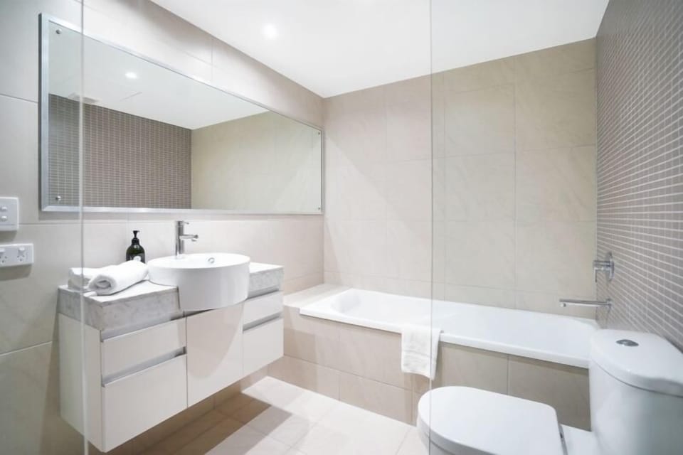 Main family bathroom with bath, shower and toilet.