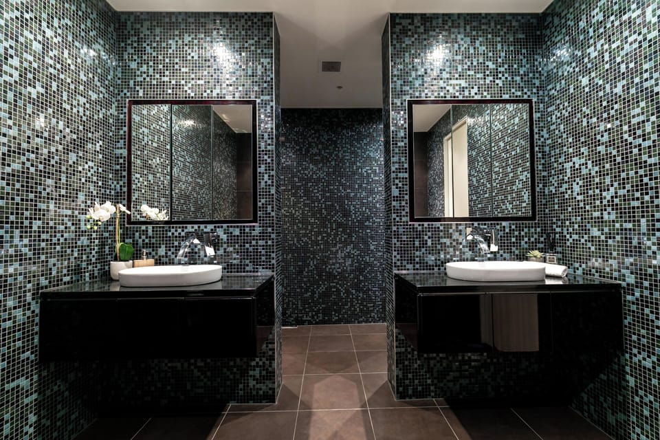 Stunning and luxurious ensuite bathroom, double basin, large walk in shower, toilet and bath.