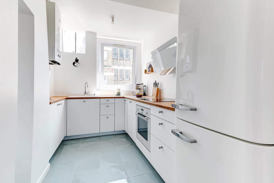 The kitchen is fully equipped to prepare a simple meal 