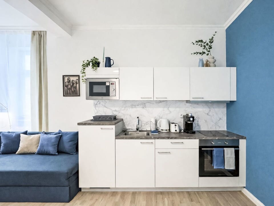 Furniture, Interior Design, Major Appliance, Room, Cabinetry, Floor, Flooring, Kitchen Appliance, Kitchen, Home Appliance