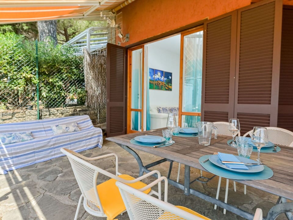 Furniture, Outdoor Furniture, Chair, Table, Flooring, Floor, Outdoor Table, Kitchen & Dining Room Table, Shade, Wood Stain