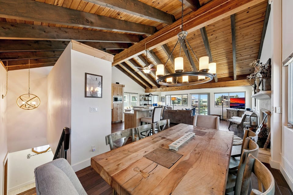 Dining area adjacent to the kitchen seats eight—ideal for shared meals, game nights, and gathering with loved ones.
