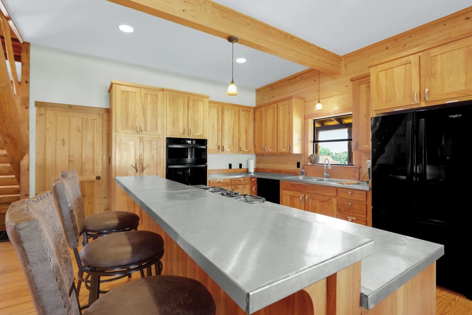 Additional seating at the kitchen bar.