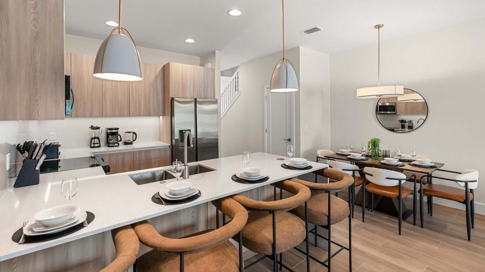 Open-concept Fully-equipped Kitchen with Bar Seating 