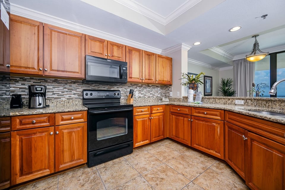 Condo, 2 Bedrooms | Private kitchen | Coffee/tea maker, fridge, oven