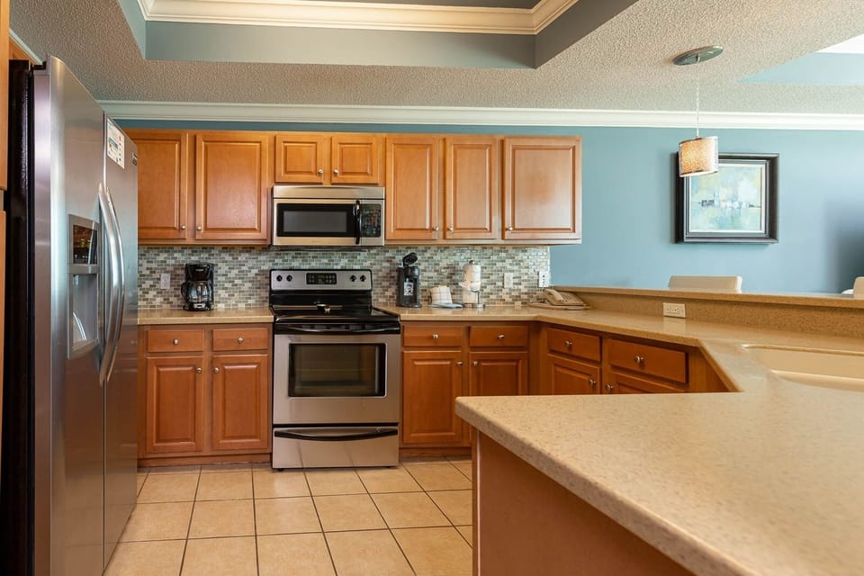 Condo, 2 Bedrooms | Private kitchen | Coffee/tea maker, fridge, oven