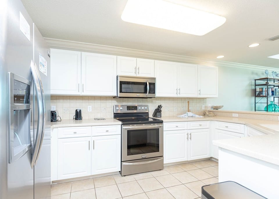 Condo, 2 Bedrooms | Private kitchen | Coffee/tea maker, fridge, oven
