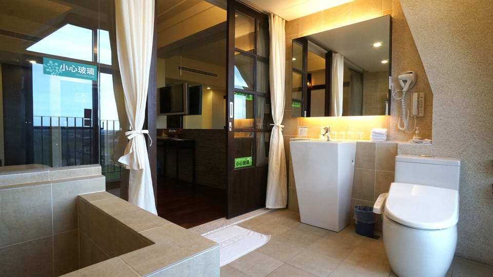 Luxury Japanese Style Family Room | Bathroom | Hair dryer, slippers, electronic bidet, towels