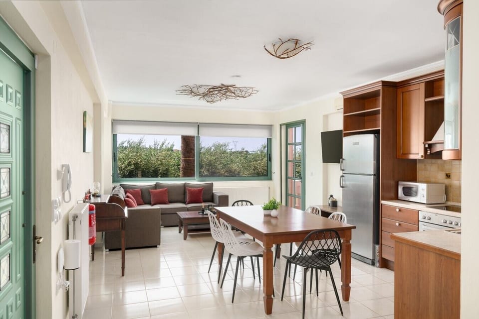 Modern open living space with fully equipped kitchen.