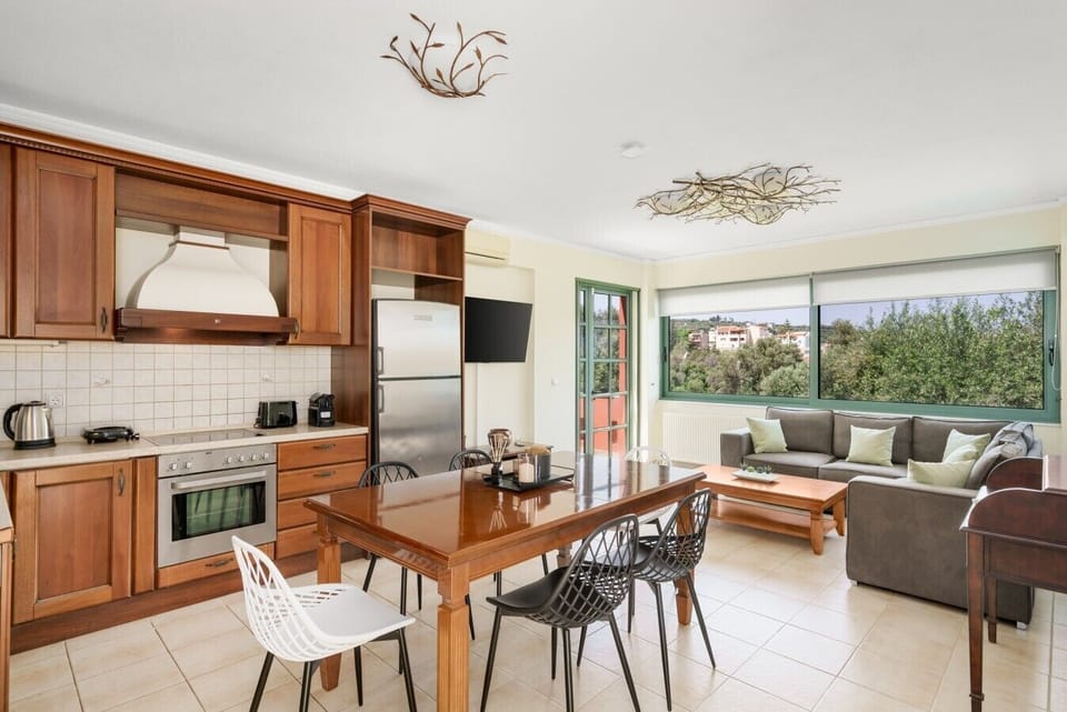 Open-concept lounge and kitchen, perfect for entertaining.