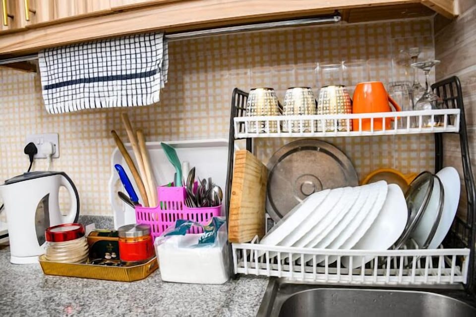 Deluxe Apartment, City View | Private kitchen | Fridge, microwave