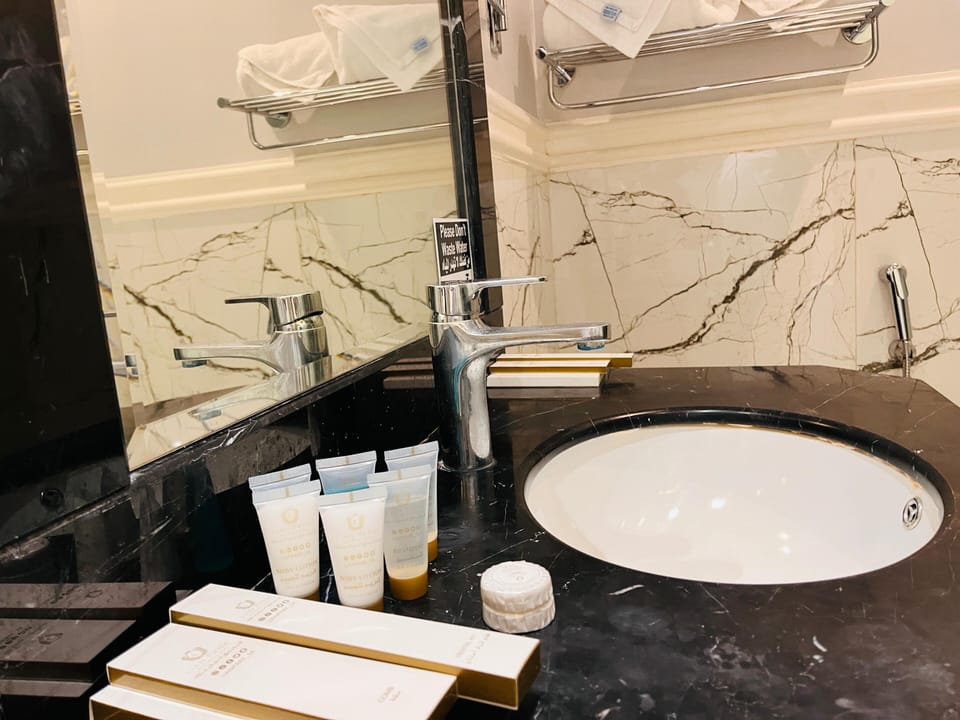 Hair dryer, towels, soap, shampoo