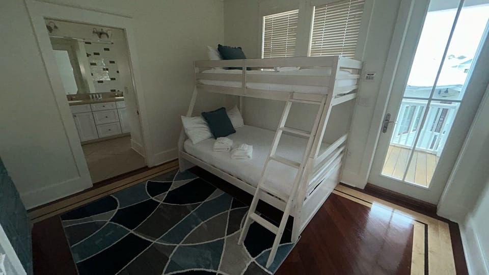 Your kids will love this bright bedroom with sturdy bunk beds, perfect for sharing adventures and bedtime stories together.