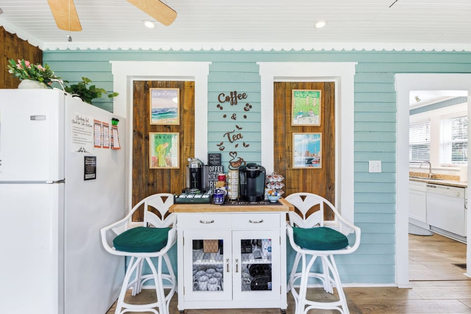 New York–style coffee bar with Nespresso, Keurig, teas, and fun NYC prints.