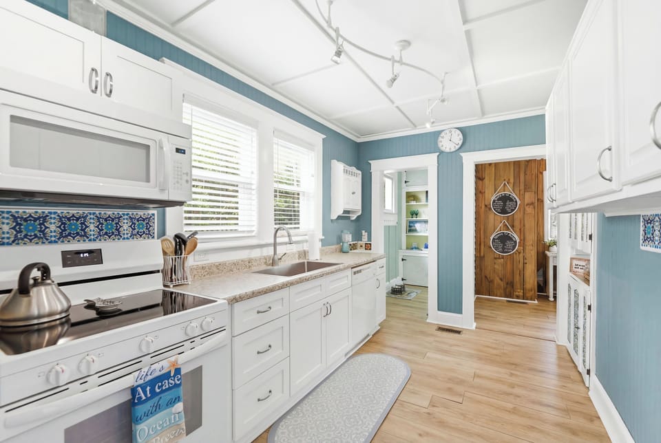 Fully stocked kitchen ready for beach breakfasts and easy dinners.
