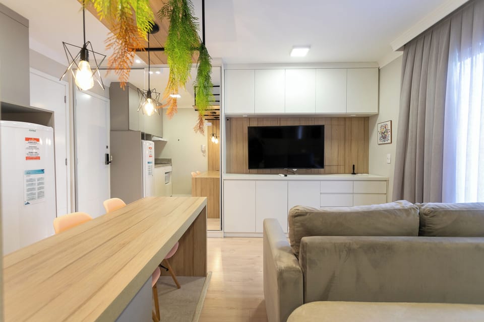 Studio Suite, Balcony, City View | Living area | Flat-screen TV