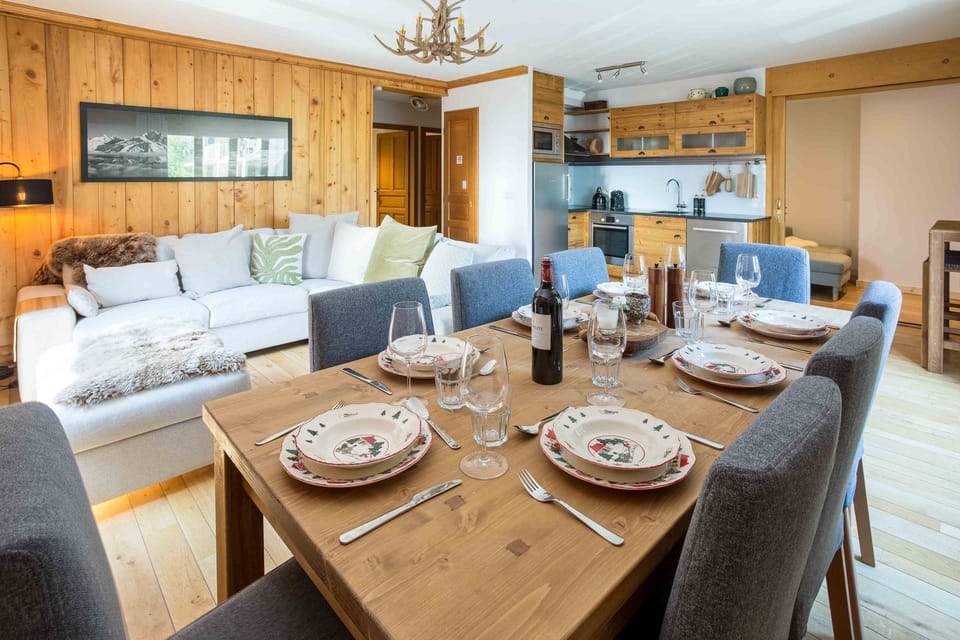 Open plan living space with dining table that seats 8
