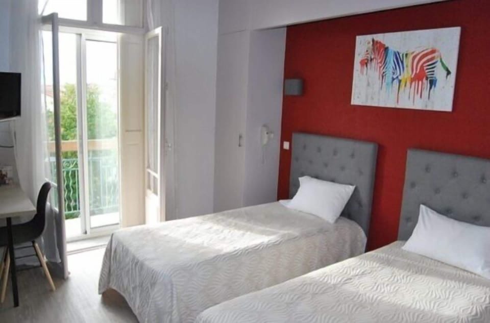 Superior Double Room, Balcony, City View | Iron/ironing board, free WiFi