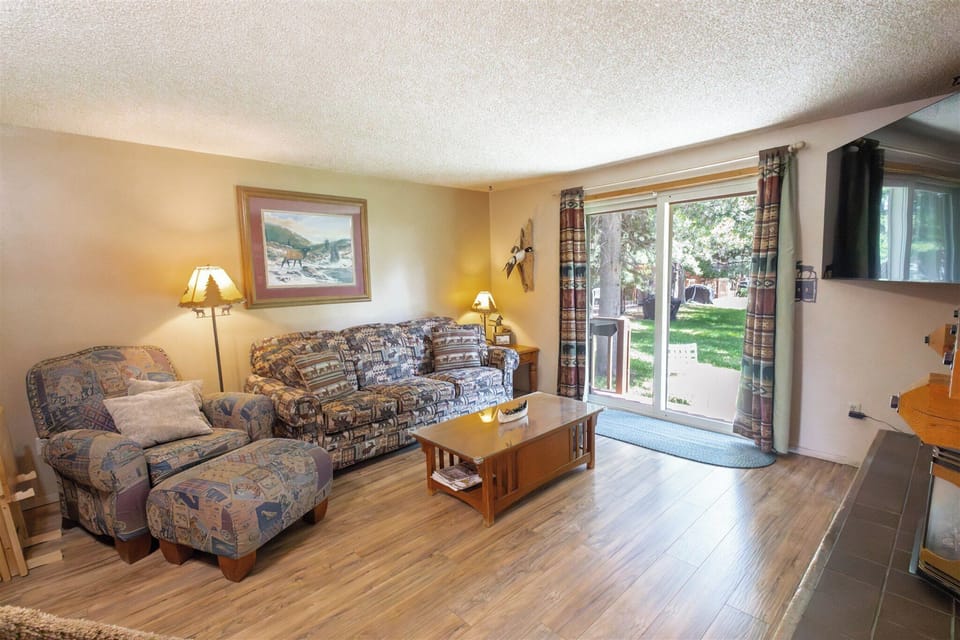 Townhome, Balcony | Living area | 65-inch Smart TV with digital channels, fireplace, streaming services