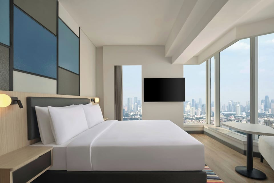 Suite, 1 Bedroom, Non Smoking, City View | Premium bedding, down comforters, minibar, in-room safe