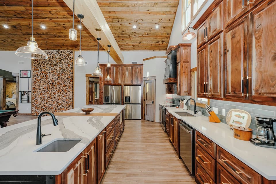Plenty of room to gather and entertain with a large island and dual sinks.  