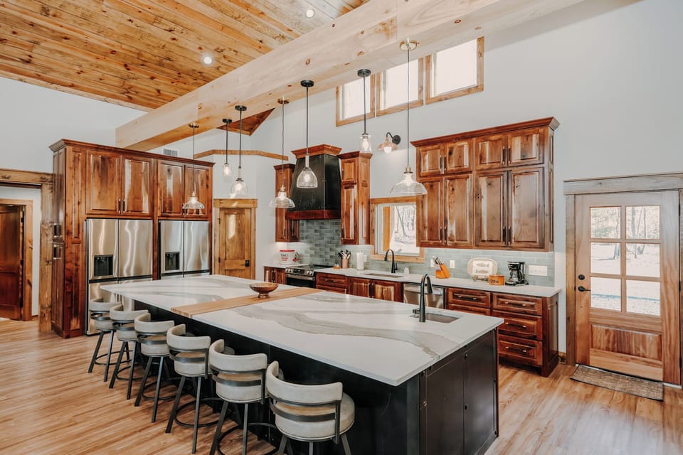 Large well-equipped kitchen, ideal for cooking and sharing meals.