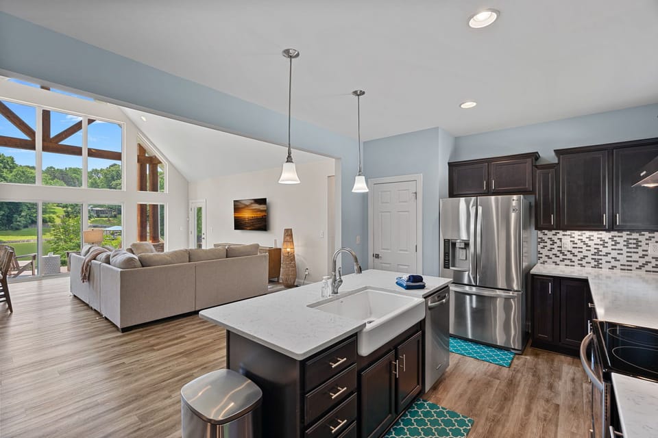 Open concept living, dining and kitchen in one open area.
