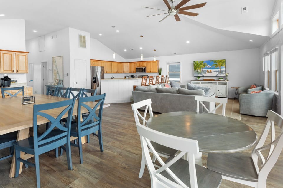 Eat in a large, well-lit Dining Area with an additional table for family meals and special moments.