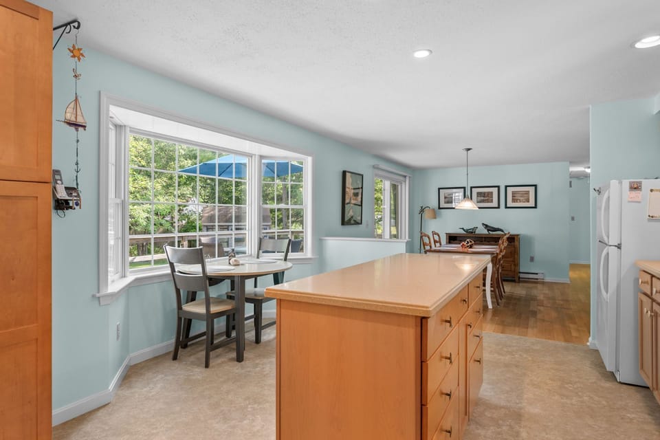 Fully equipped kitchen looking into the dining area
