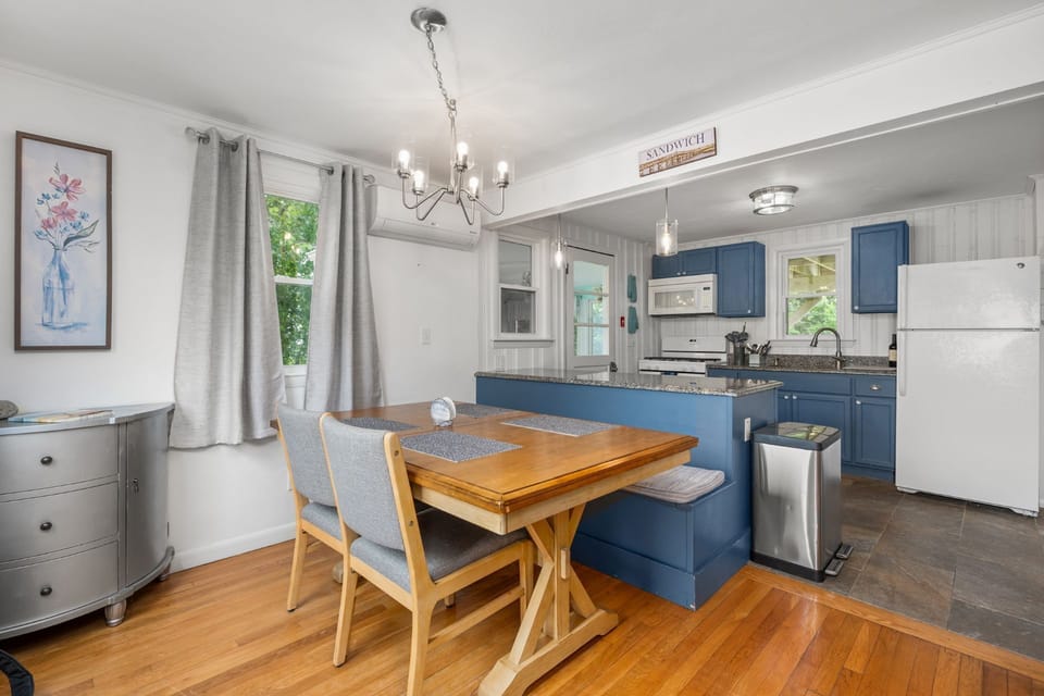Dining area with views into kitchen