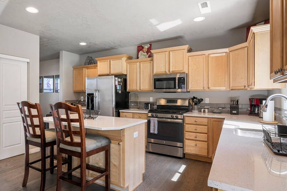 The kitchen has ample counter space and up to date appliances.