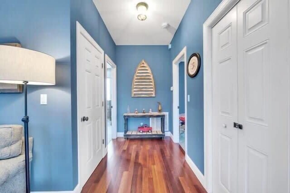 Our welcoming hallway connects the heart of the home, guiding you to cozy rooms and inviting spaces. 