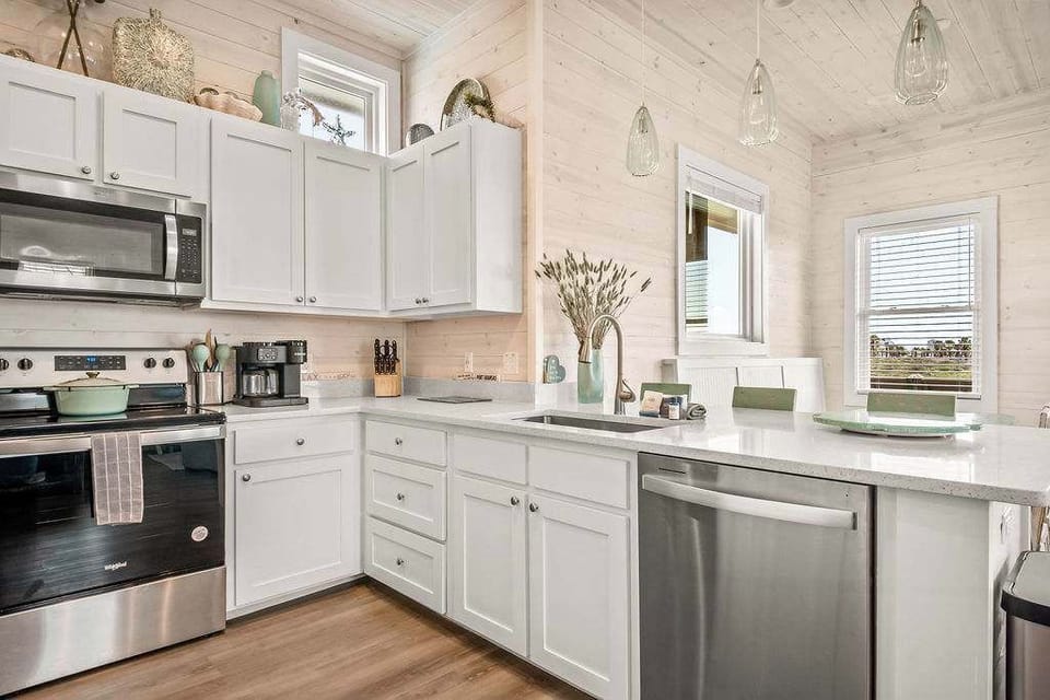 With high-end appliances, cookware, and coastal charm, it’s ready for all your culinary adventures.
