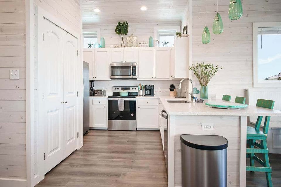 With high-end appliances, cookware, and coastal charm, it’s ready for all your culinary adventures.