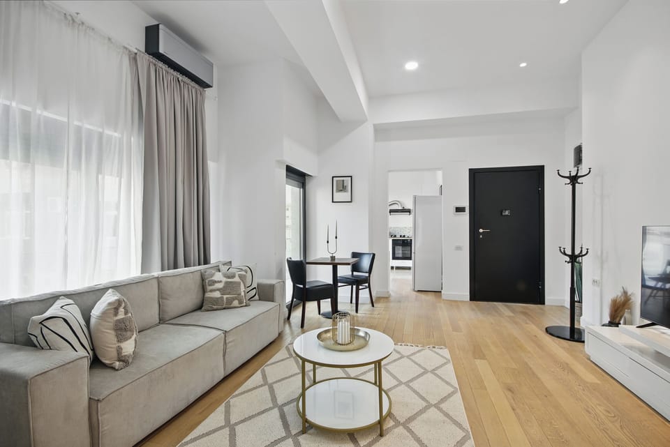 Urban Garden Loft | Living area | 50-inch LED TV with satellite channels