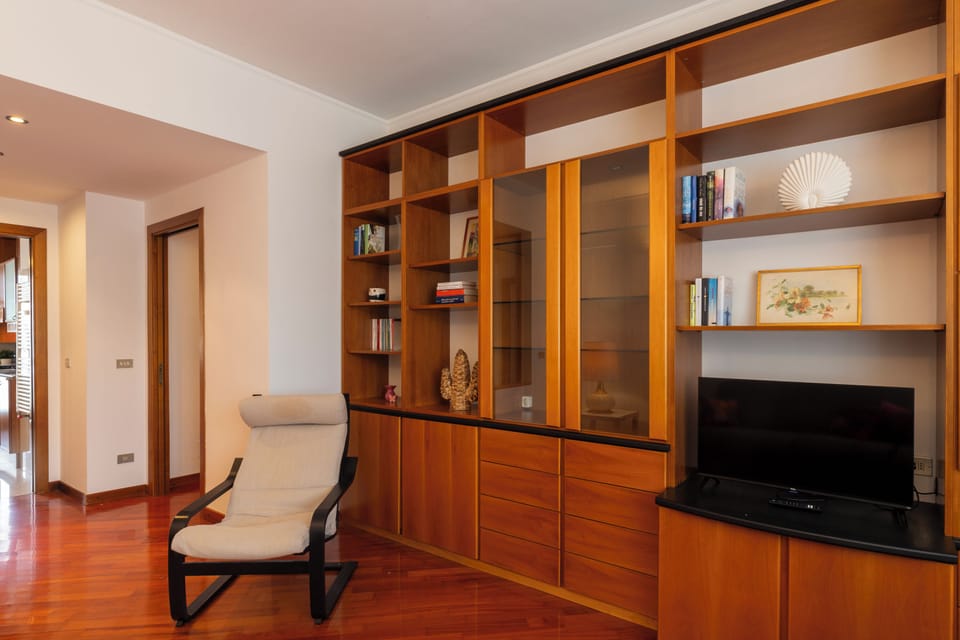 Comfort Apartment, Balcony, City View | Living area | 32-inch Smart TV with digital channels