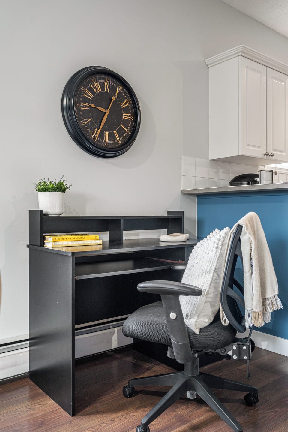 Work area off the kitchen and living areas for those travelling for work 