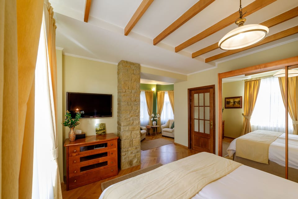 Classic Suite, 2 Bedrooms, Balcony | Blackout drapes, soundproofing, iron/ironing board, free WiFi