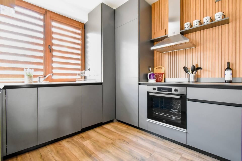 Cook, dine, and feel at home with everything you need in this sleek, fully equipped kitchen