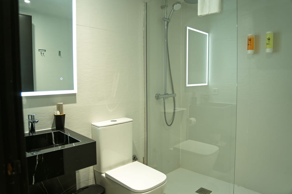 Shower, hair dryer, bathrobes, slippers