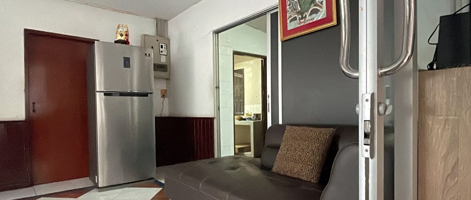 Three-Bedroom House | Living area | 40-inch TV with digital channels