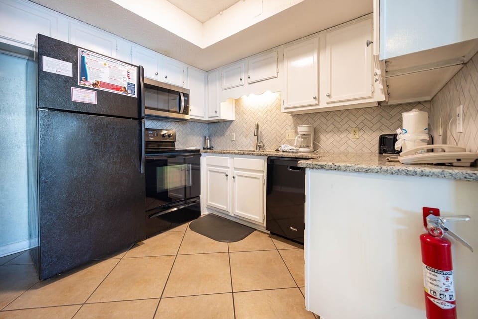 Condo, 2 Bedrooms | Private kitchen | Coffee/tea maker, fridge, oven