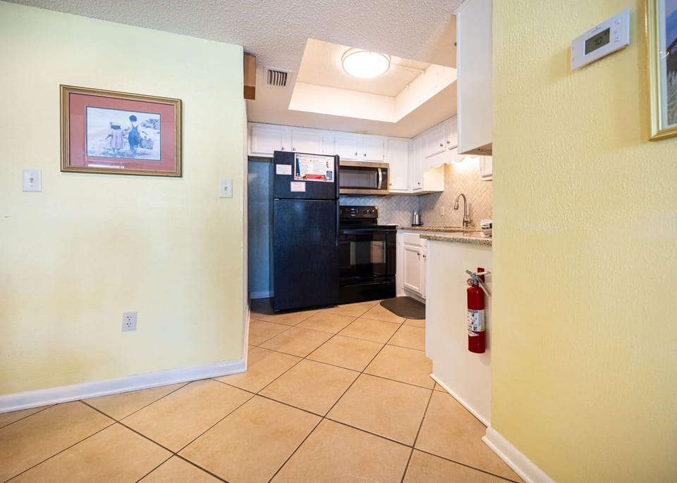 Condo, 2 Bedrooms | Private kitchen | Coffee/tea maker, fridge, oven