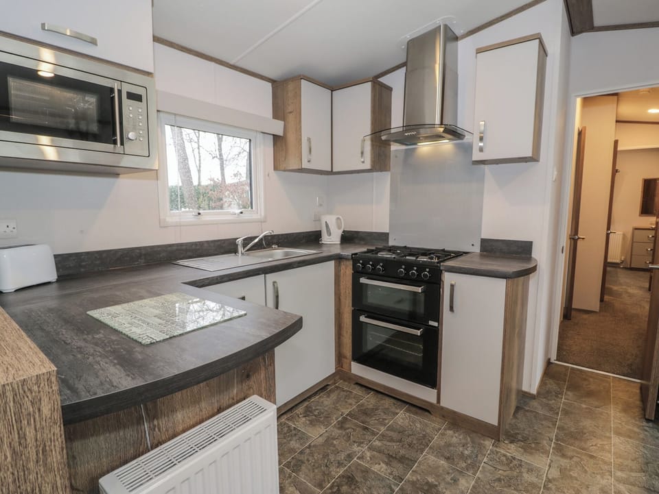 Fridge, microwave, toaster, cookware/dishes/utensils