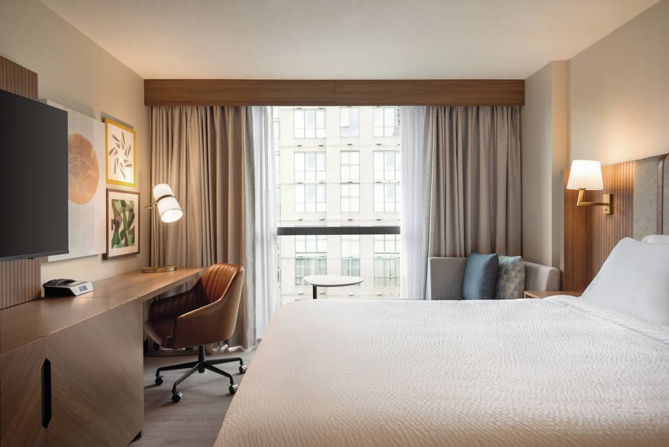 Desk, blackout drapes, iron/ironing board, free cribs/infant beds