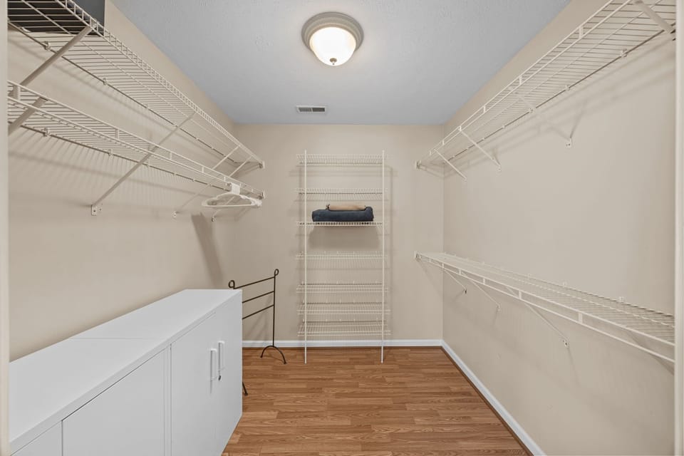 Huge walk-in closet. Pack n play, iron, and ironing board are stored here. 