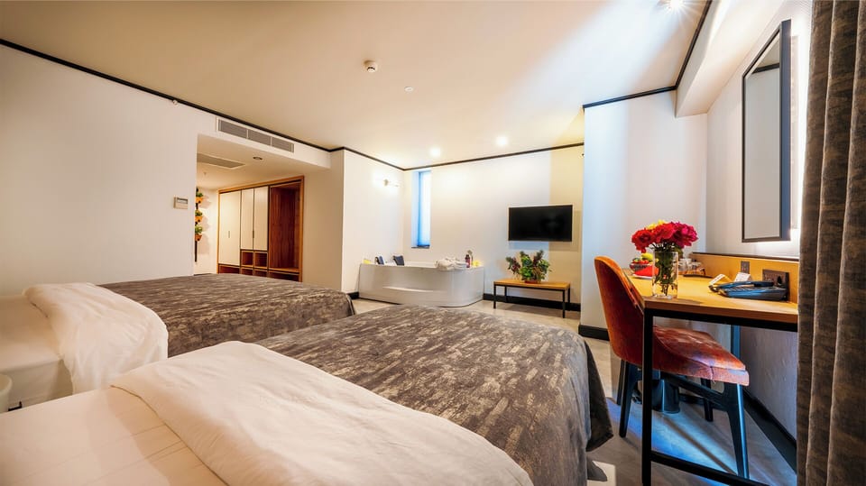 Corner Suite -Main Building | Premium bedding, in-room safe, soundproofing, free WiFi